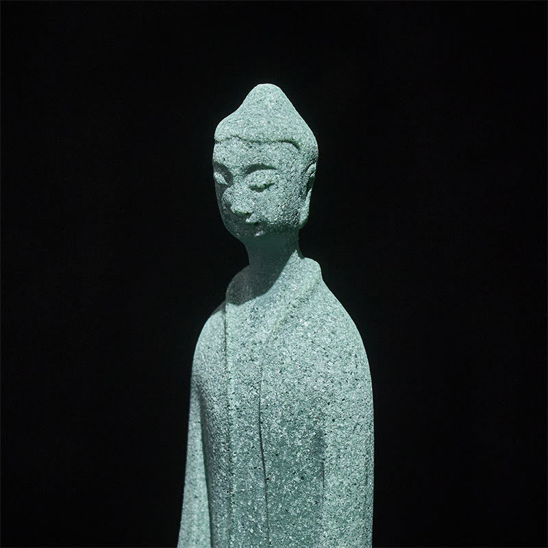 Sandstone Meditation Buddha Desk Statue – closeup of serene face and grain texture, macro detail