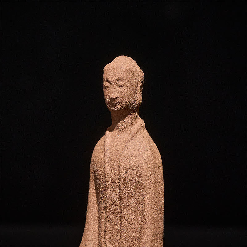 Ceramic Sitting Buddha Prayer Statue – Side closeup of face and robe texture with granular detail, macro