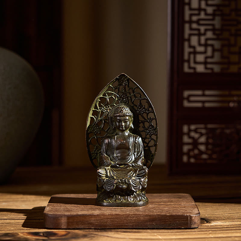 Tathagata Buddha Alloy Statue – Front display on wood desk in soft natural light, spiritual decor