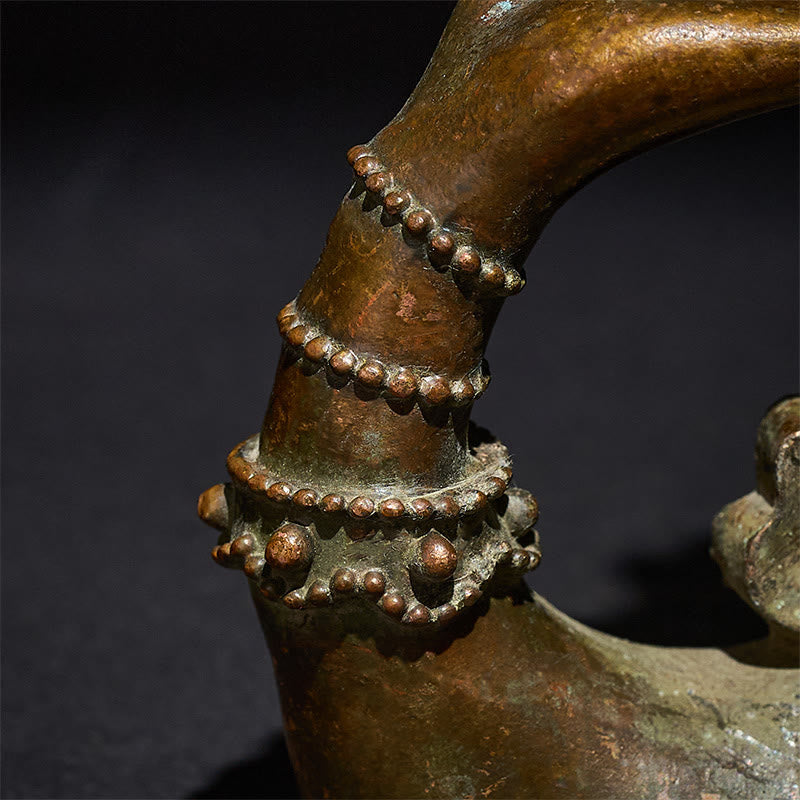 Buddha Hand Lotus Alloy Statue – Closeup of beaded arm bands and aged bronze finish, detail