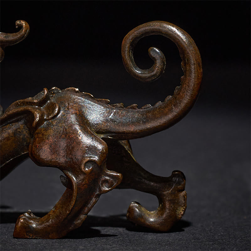Feng Shui Pixiu Alloy Wealth Luck Decoration Ornament – Close-up of bronze Pixiu rear legs and curled tail, dark background
