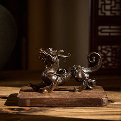 Feng Shui Pixiu Alloy Wealth Luck Decoration Ornament – Bronze Pixiu on wood base in Chinese room, warm ambient lighting