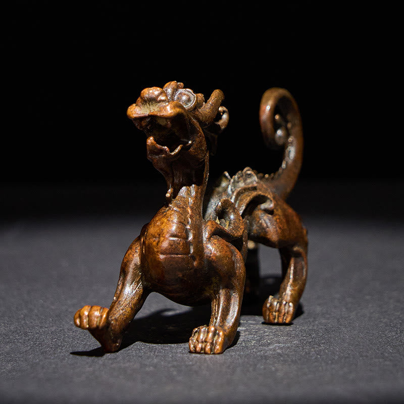 Feng Shui Pixiu Alloy Wealth Luck Decoration Ornament – Bronze Pixiu front angle showing open mouth and curled tail, dark bg