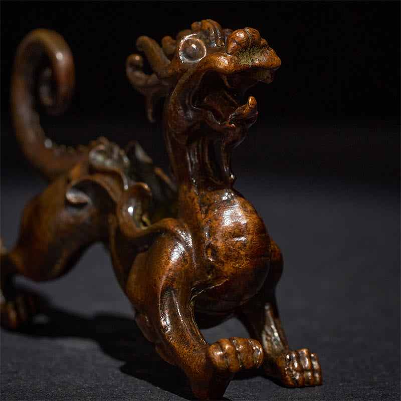 Feng Shui Pixiu Alloy Wealth Luck Decoration Ornament – Close-up front view of bronze Pixiu head and chest, black background