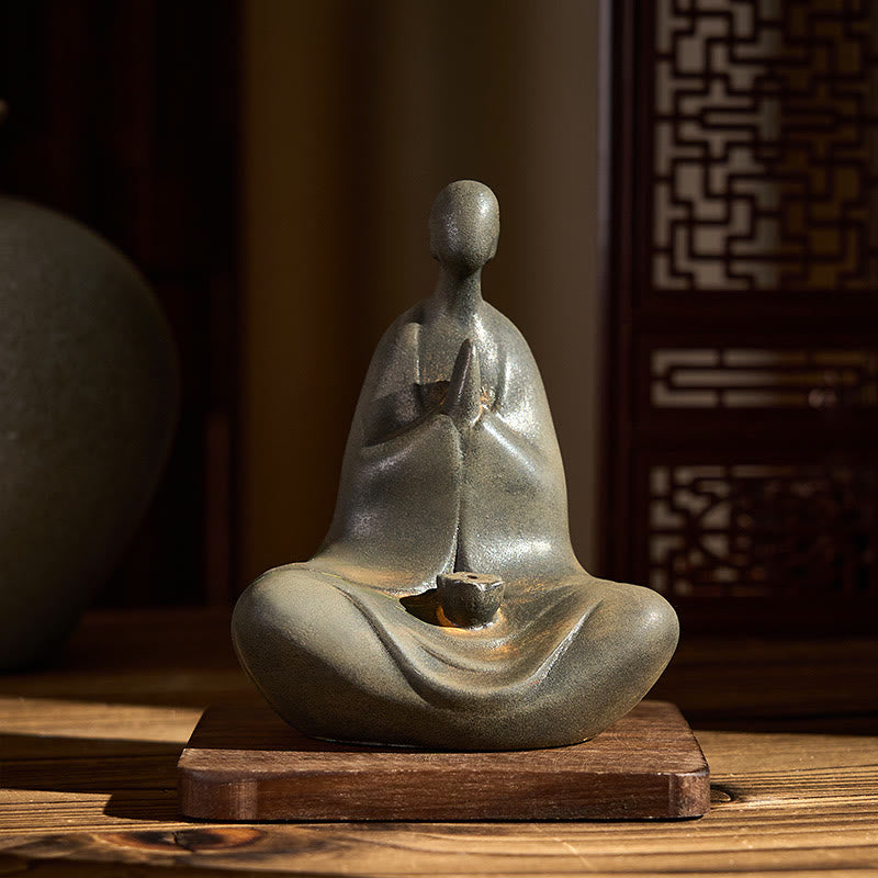 Iron Powder Formless Buddha Statue – front view on wooden base with oriental screen backdrop, home altar decor
