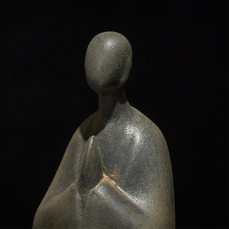Iron Powder Formless Buddha Statue – closeup of head and upper body revealing iron powder texture, artistic detail