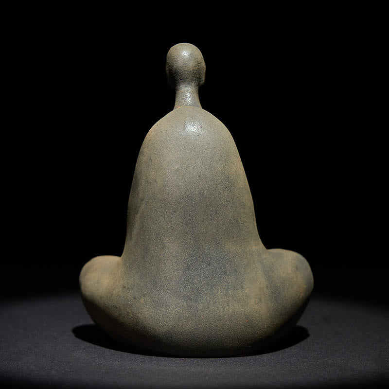 Iron Powder Formless Buddha Statue – back view showing smooth flowing robe contours on dark background, formless design