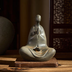 Iron Powder Formless Buddha Statue – front view on wooden base with oriental screen backdrop, home altar decor
