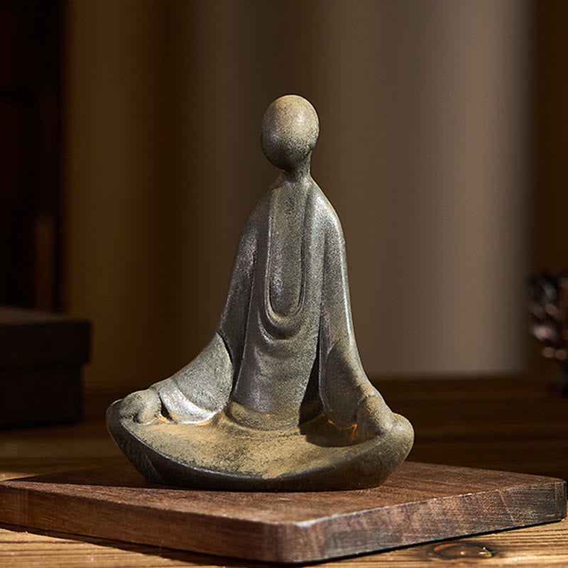 Iron Powder Sitting Formless Buddha Statue – angled front view on wood base, natural light, zen altar
