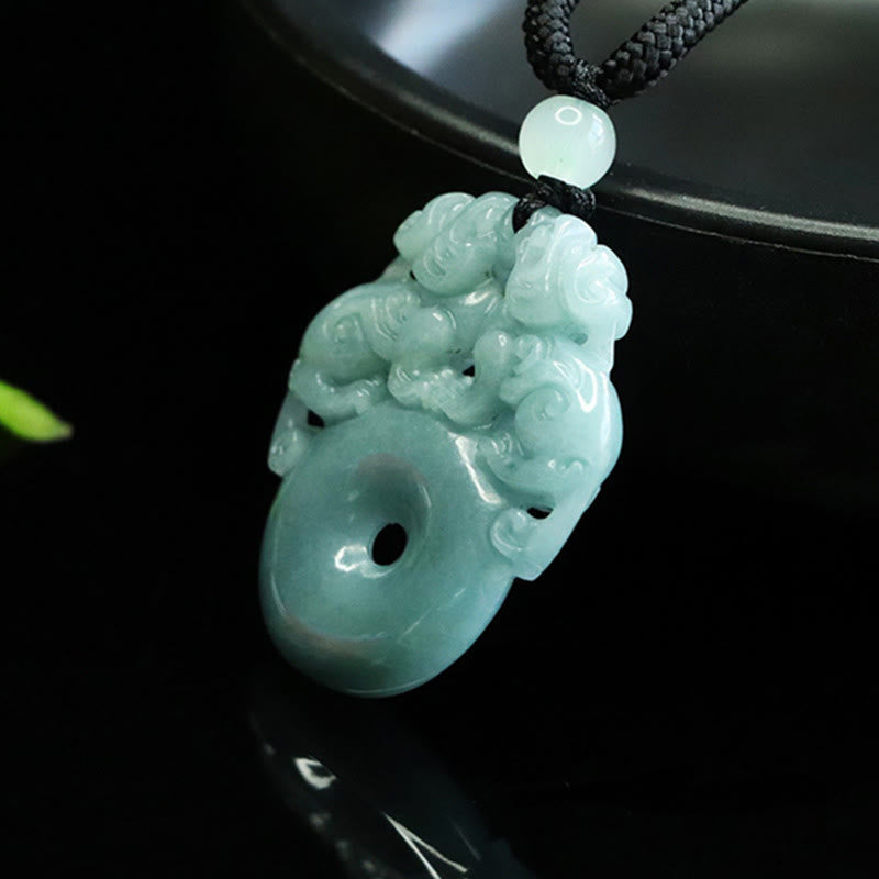 Double Pixiu Jade Peace Buckle String Necklace – side view on black reflective surface, jade peace buckle