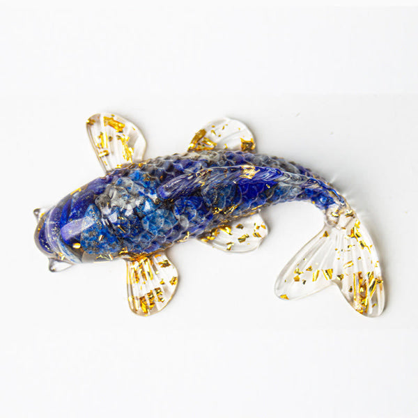 Koi Fish Crystal Chip Resin Decoration – blue lapis lazuli koi fish figurine with gold leaf accents on white background