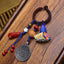 Chinese Zodiac Nine Palaces Dzi Bead Buddha Serenity Key Chain – nine palaces pattern detail, ancient dzi bead key ring