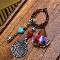 Chinese Zodiac Nine Palaces Dzi Bead Buddha Serenity Key Chain – dzi bead held in hand, natural agate stone keychain