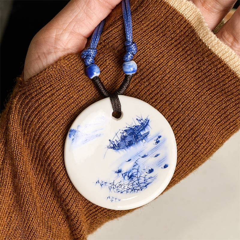 Ceramic Peony & Lotus Pendant – Fishing boat porcelain held on brown knit fabric, knotwork necklace