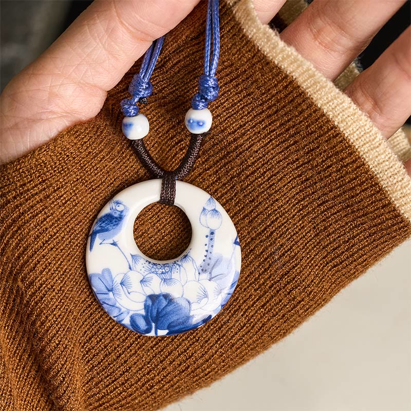 Ceramic Peony & Lotus Pendant – Hand-held bi disc on brown knit with adjustable cord, porcelain necklace