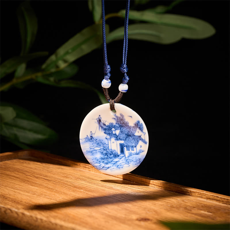 Ceramic Peony & Lotus Pendant – Chinese landscape with bridge and figures on dark backdrop, porcelain pendant