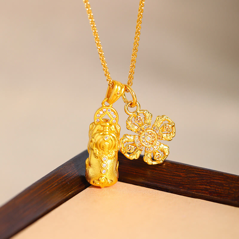 24K Gold Plated Pixiu Cross Dorje Vajra Necklace – pendant on dark wood corner, diamond accent detail