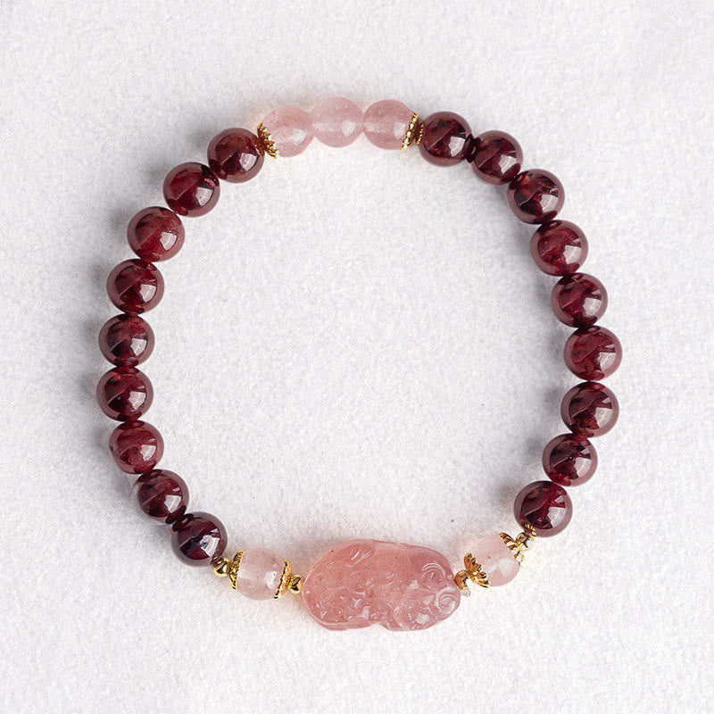 Garnet Strawberry Quartz Pixiu Bracelet – overhead flat lay white background, feng shui wealth luck