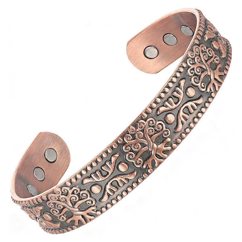 Tree of Life Copper Cuff Bracelet – white background angled view showing magnetic ends, copper wellness bangle