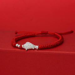 999 Silver Koi Fish Red String Bracelet – red braided cord with silver fish charm and spacer beads on red stepped platform