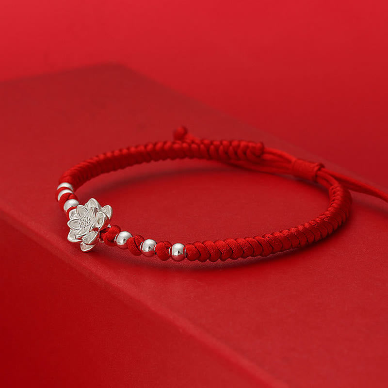Sterling Silver Lotus Red String Luck Bracelet – macro close-up of silver lotus flower charm detail, elegant