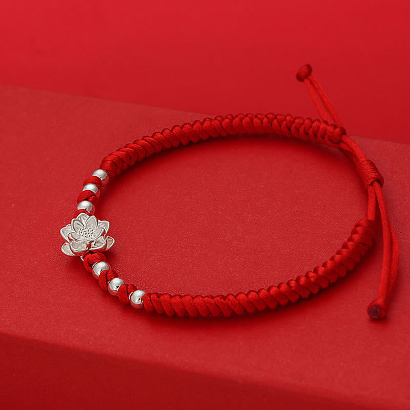 Sterling Silver Lotus Red String Luck Bracelet – lotus centerpiece flanked by six silver beads, meaningful