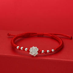 Sterling Silver Lotus Red String Luck Bracelet – silver lotus charm with symmetrical beads on woven red cord, spiritual
