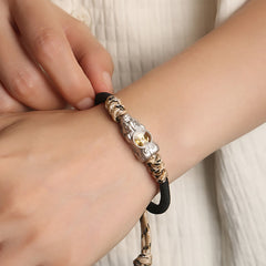 Pi Xiu Wealth Luck Hand-Woven Rope Bracelet Adjustable – silver Pi Xiu on wrist close-up, hand-woven wealth charm