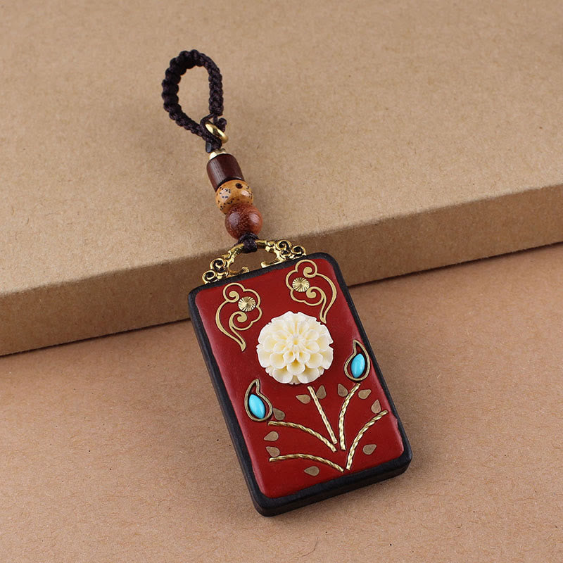 Ebony Koi Fish Fu Character Keychain – red lacquer pendant with carved white flower, gold filigree clouds, turquoise inlays