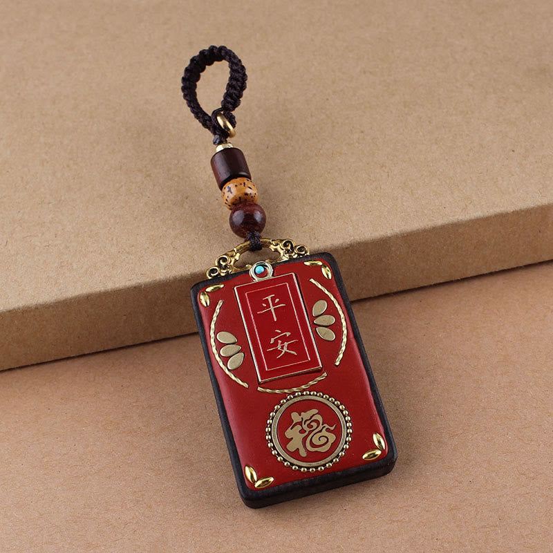 Ebony Koi Fish Fu Character Keychain – red lacquer pendant with gold Ping An peace and Fu fortune characters on kraft paper