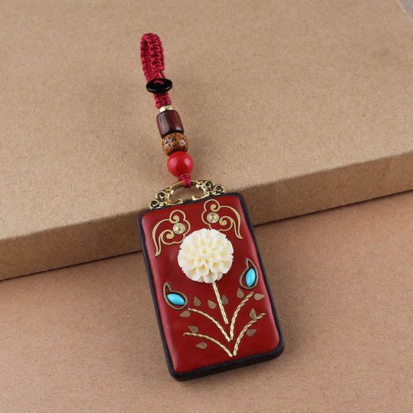 Ebony Koi Fish Fu Character Keychain – red lacquer carved flower pendant with gold clouds and turquoise on red beaded cord