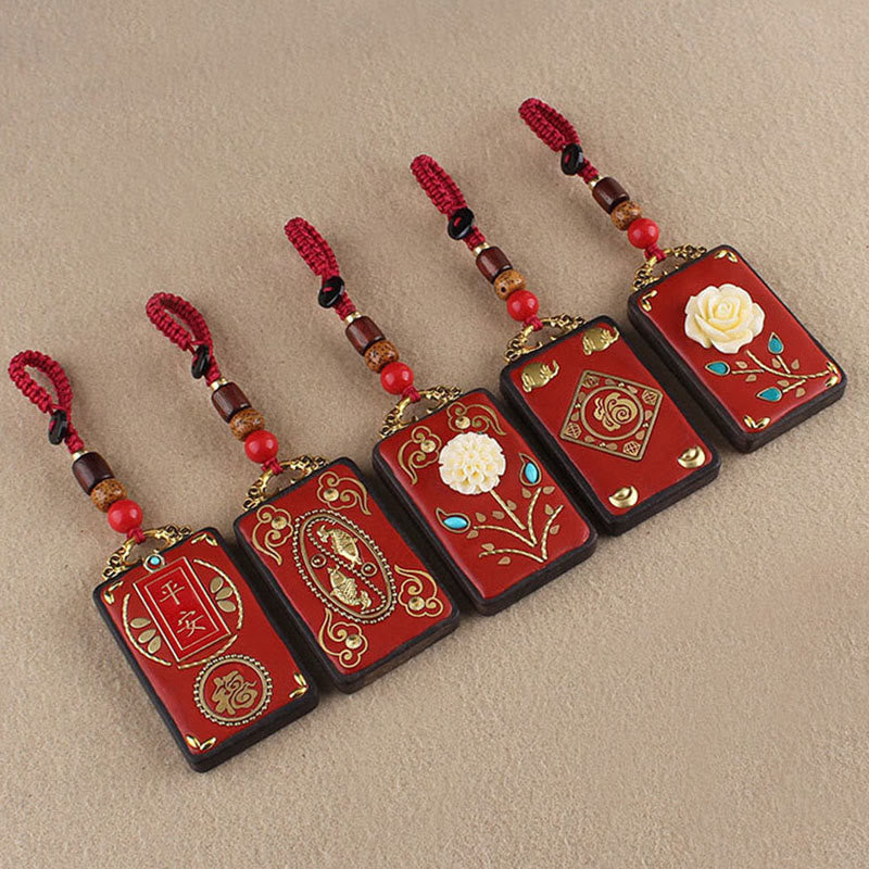Ebony Koi Fish Fu Character Keychain – five Chinese amulet keychains with koi, roses, and Fu symbols diagonal display