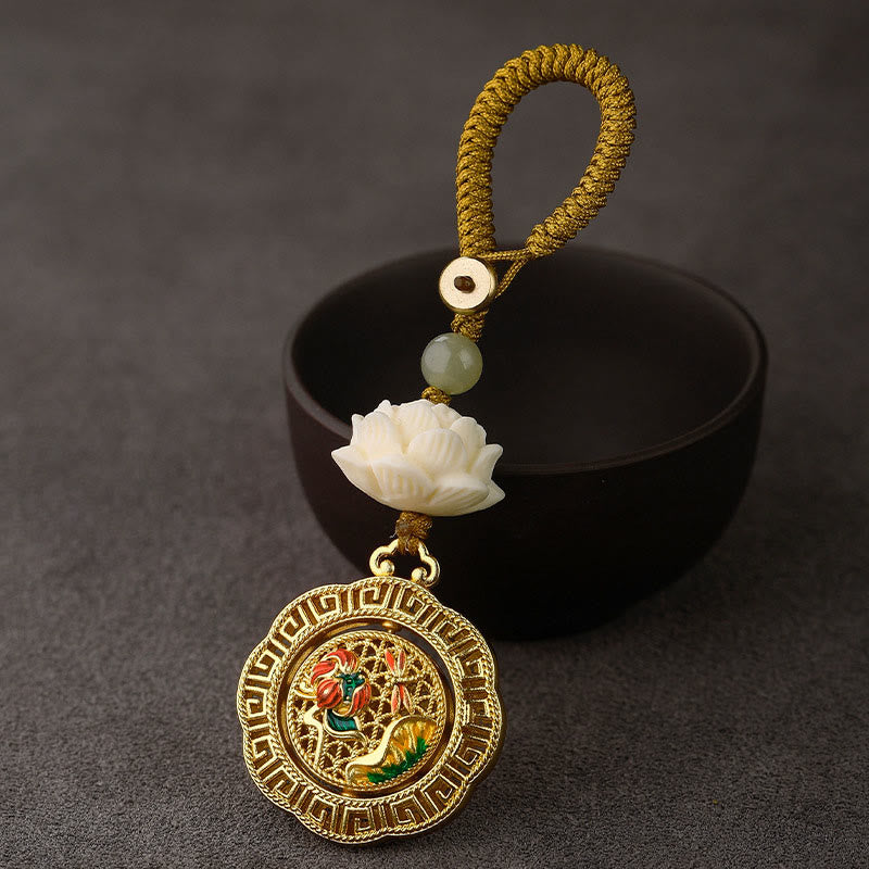 Bodhi Seed Lotus Jade Key Chain - Gold cloisonne lotus pendant with green cord, jade bead, and ceramic bowl