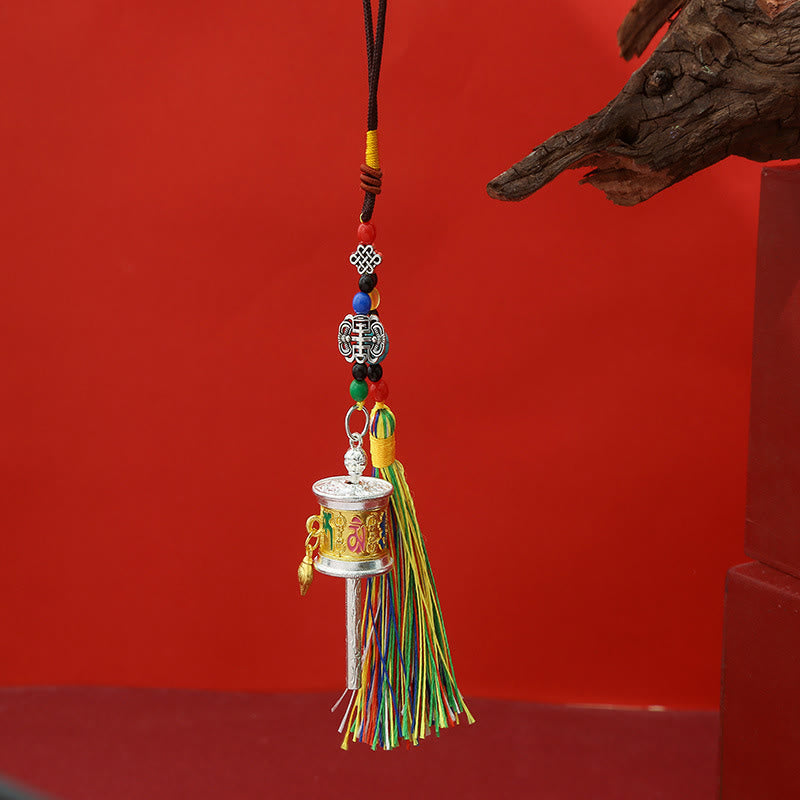 Tibetan Mani Wheel Ornament, gold and red enamel details, colorful bead strand