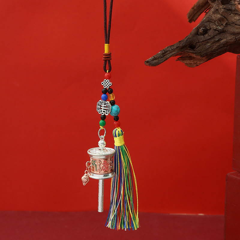 Om Mani Padme Hum Prayer Wheel with red and green inlay, spiritual hanging ornament