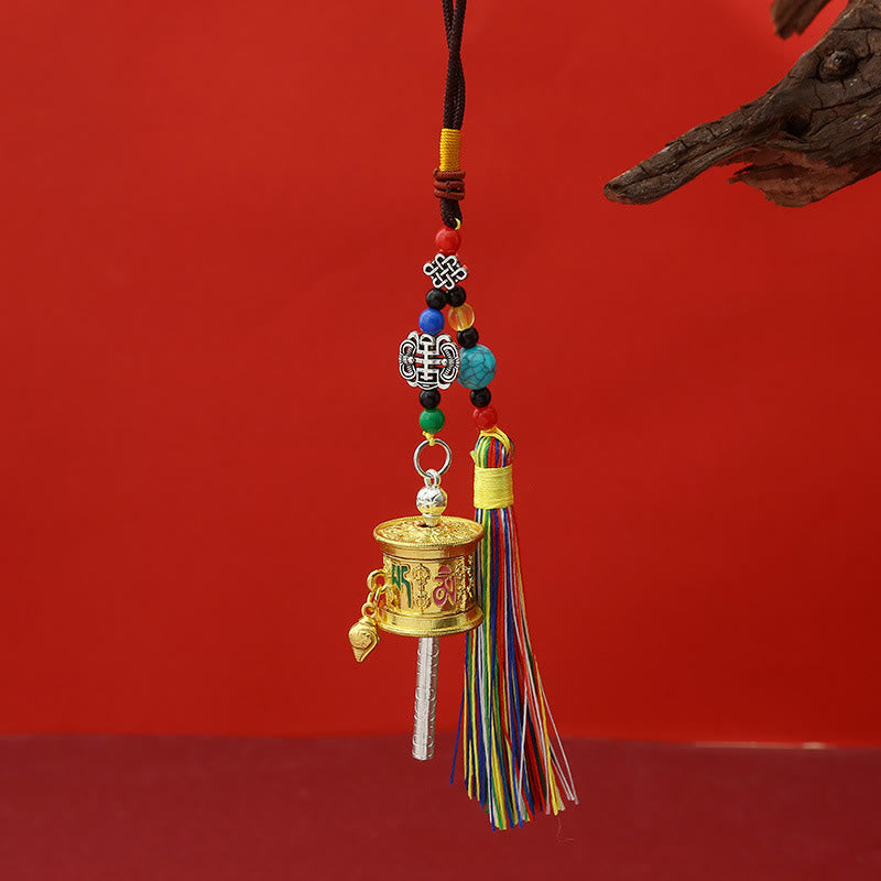 Golden Tibetan Prayer Wheel with engraved handle, colorful tassel, Buddhist decor