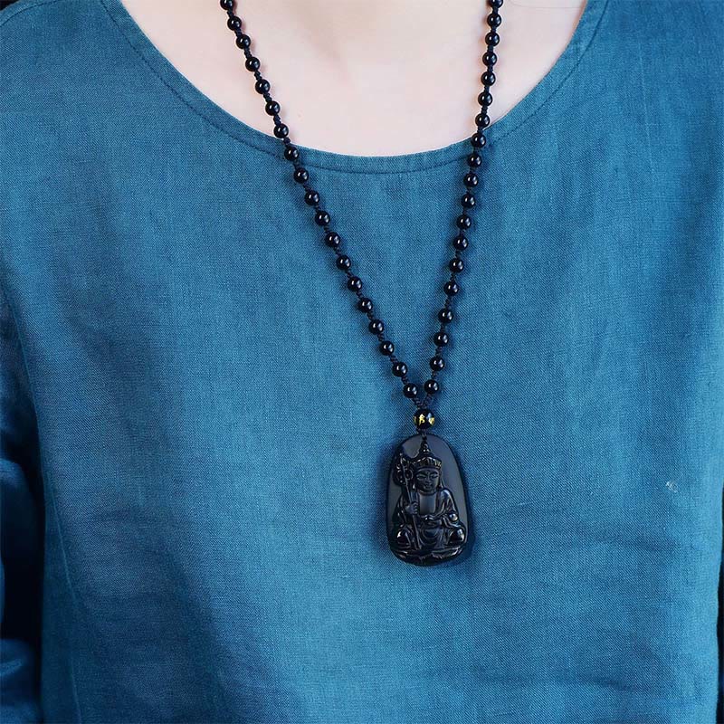Ksitigarbha Buddha Black Obsidian Pendant Necklace – close-up face detail, compassionate buddha expression