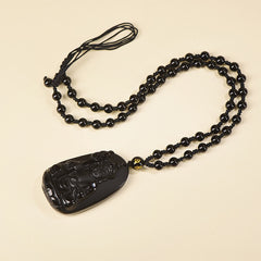 Ksitigarbha Buddha Black Obsidian Pendant Necklace – front view ksitigarbha carving, protective obsidian charm