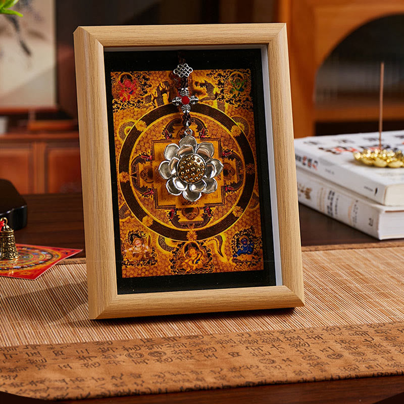 Lotus Golden Inlot Thangka Frame - Gold mandala with hanging lotus charm on oak frame, black mat border