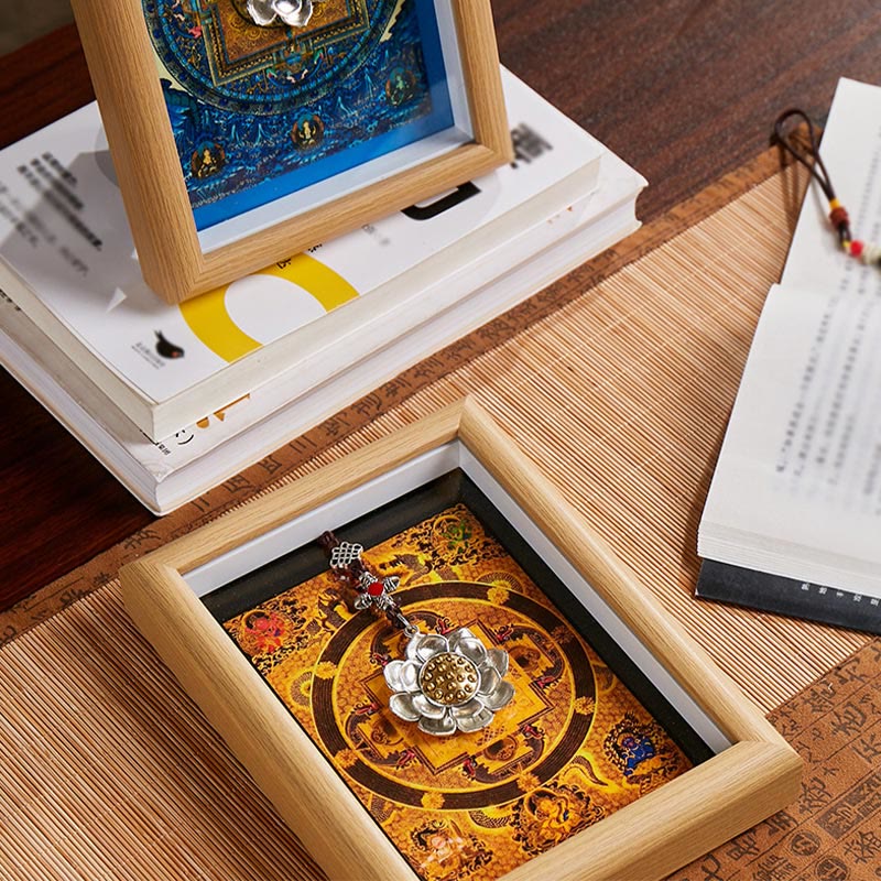 Lotus Golden Inlot Thangka Frame - 45-degree view of gold mandala shadow box with lotus and open book, zen