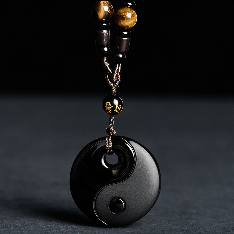 Obsidian Yin Yang Pendant with braided cord, silver spacers, healing stone necklace
