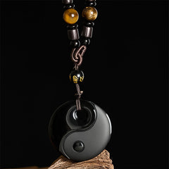 Black Obsidian Yin Yang Necklace front view, gold inscribed bead, spiritual pendant