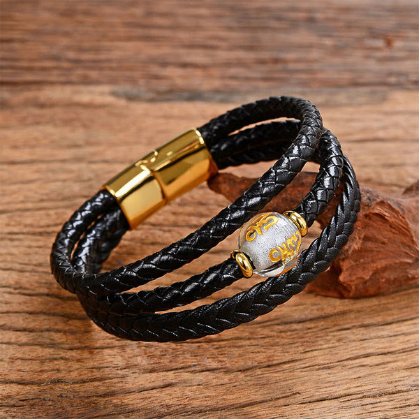 Leather Mantra Bracelet - Silver mantra bead with gold symbols on triple black leather, spiritual jewelry