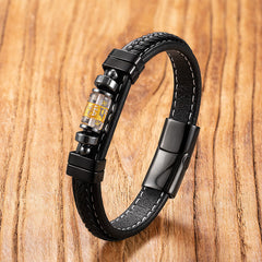 Black Onyx Om Mani Padme Hum Dragon Bracelet – full assembled view on wood with clasp and black cord, Harmony