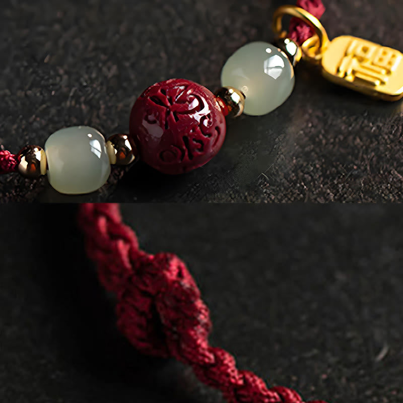 Hetian Jade Cinnabar Bracelet – close-up of carved cinnabar bead with jade stones and braided red cord detail, lucky charm bracelet