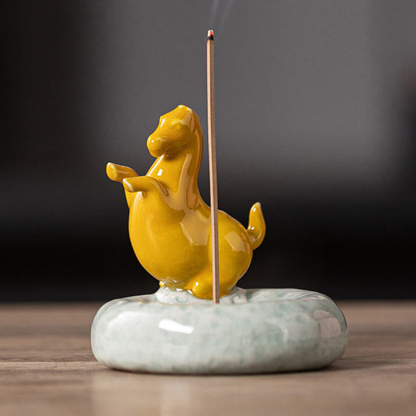 Year of the Horse Incense Burner – Golden amber figure on celadon base with incense smoke