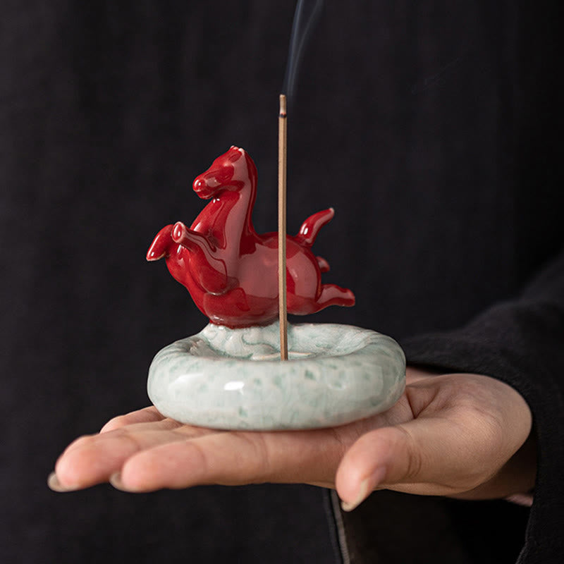 Year of the Horse Incense Burner – Red horse held in hand showing compact size, burning incense