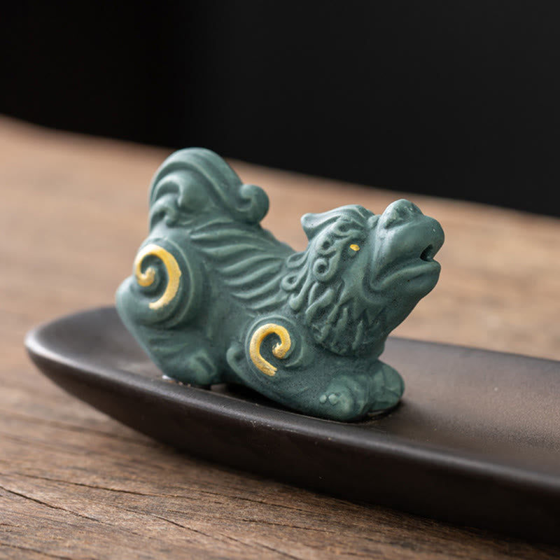 Pixiu Wealth Ceramic Incense Burner – teal Pixiu statue detail, gold swirl patterns ceramic