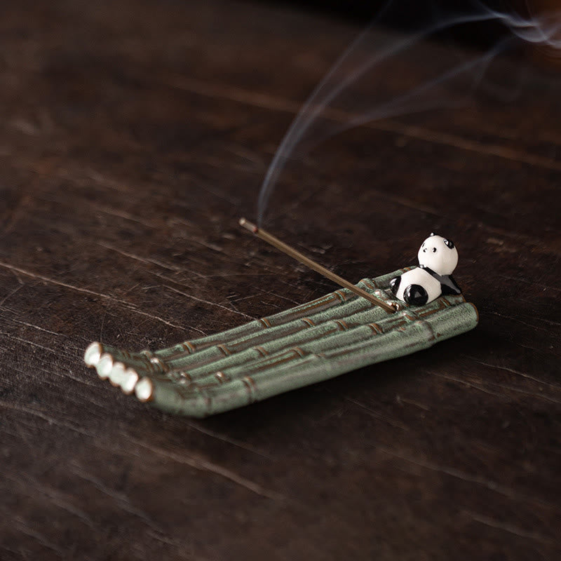 Panda Ceramic Incense Burner - Panda lounging on sage green bamboo raft with smoke, zen decor