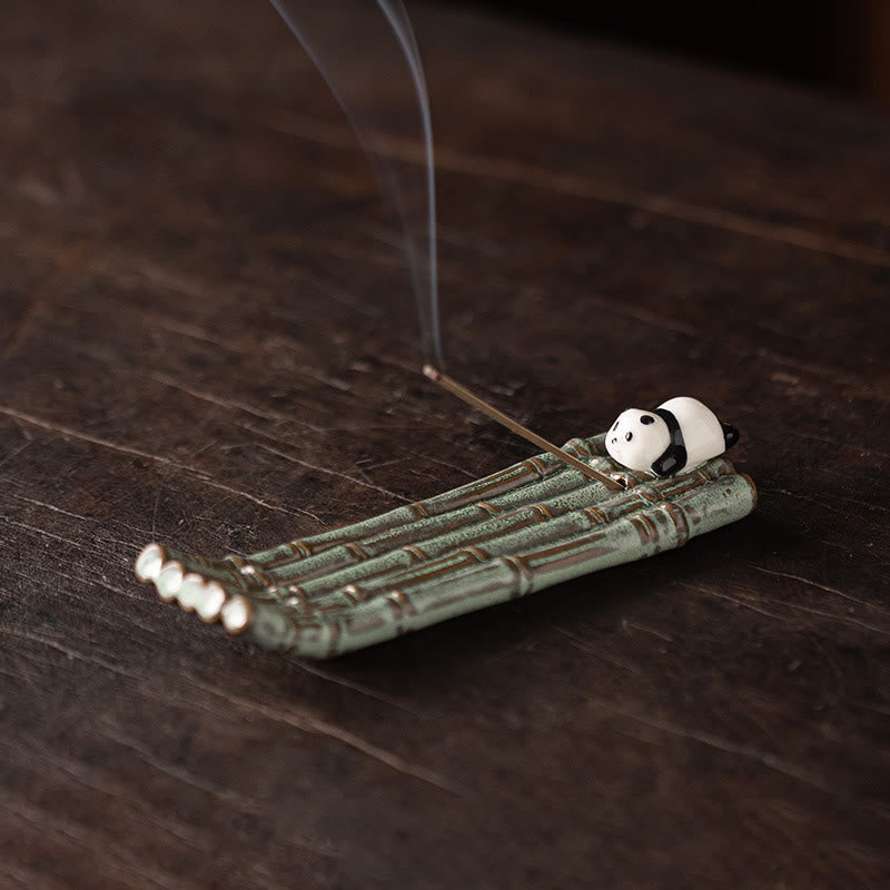 Panda Ceramic Incense Burner - Panda relaxing on bamboo raft with rising smoke, zen decor piece